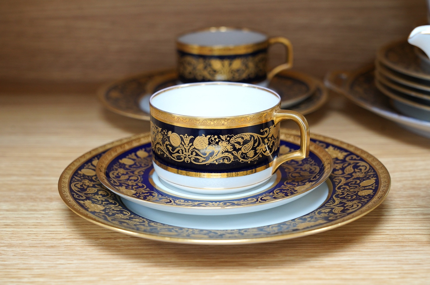 A Comte Harrach, Karlsbad, Bavarian rich dark blue and gilt banded part tea set, largest 32cm wide. Condition - fair to good